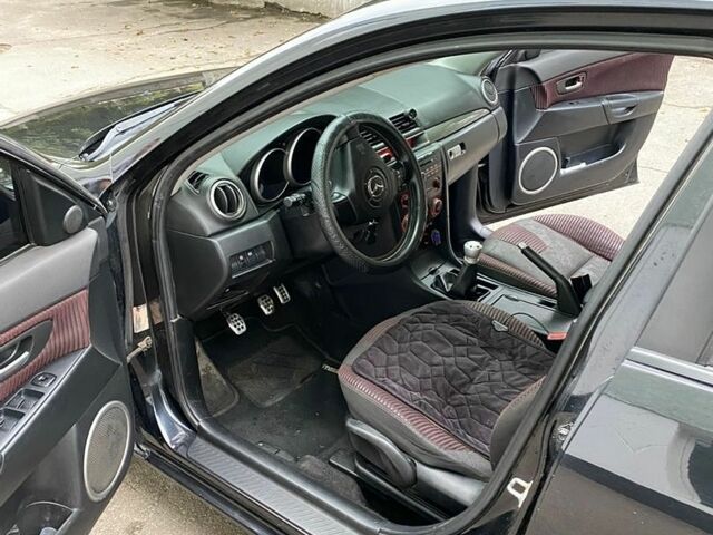 Черный Мазда 3, объемом двигателя 2 л и пробегом 315 тыс. км за 3500 $, фото 18 на Automoto.ua