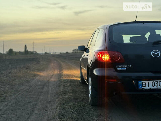 Черный Мазда 3, объемом двигателя 1.6 л и пробегом 155 тыс. км за 4300 $, фото 4 на Automoto.ua