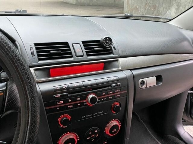 Черный Мазда 3, объемом двигателя 2 л и пробегом 315 тыс. км за 3500 $, фото 21 на Automoto.ua