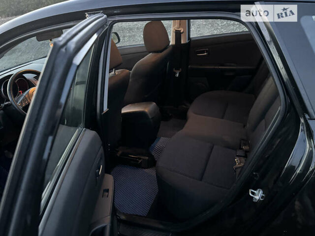 Черный Мазда 3, объемом двигателя 1.6 л и пробегом 155 тыс. км за 4300 $, фото 12 на Automoto.ua