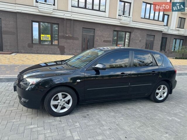 Чорний Мазда 3, об'ємом двигуна 1.6 л та пробігом 170 тис. км за 4199 $, фото 7 на Automoto.ua