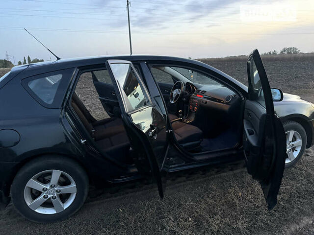 Черный Мазда 3, объемом двигателя 1.6 л и пробегом 155 тыс. км за 4300 $, фото 11 на Automoto.ua