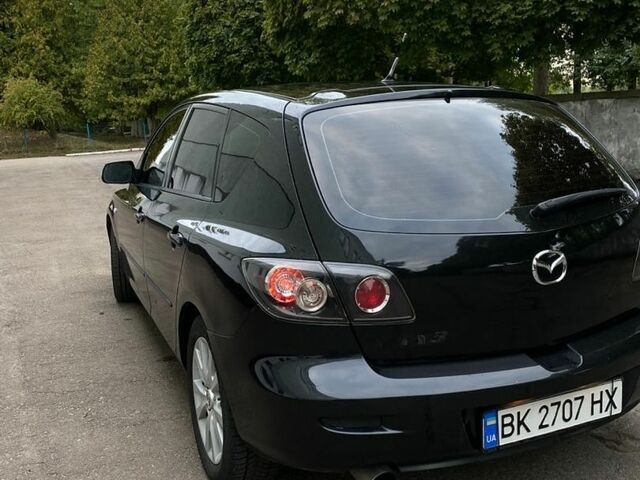 Черный Мазда 3, объемом двигателя 2 л и пробегом 315 тыс. км за 3500 $, фото 5 на Automoto.ua