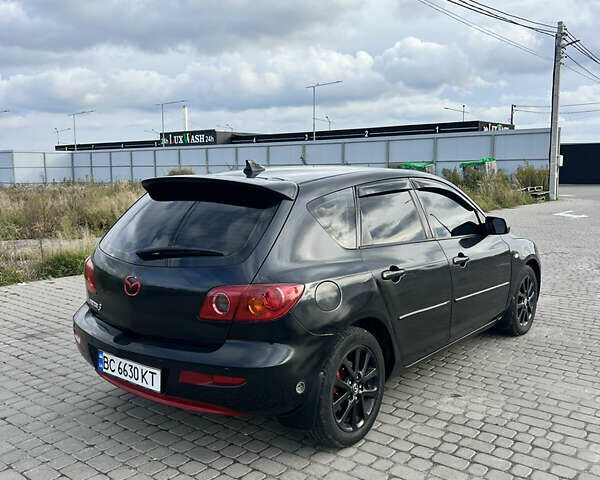 Чорний Мазда 3, об'ємом двигуна 1.6 л та пробігом 220 тис. км за 4700 $, фото 4 на Automoto.ua