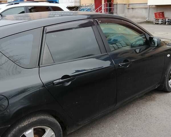 Черный Мазда 3, объемом двигателя 2 л и пробегом 182 тыс. км за 4800 $, фото 2 на Automoto.ua