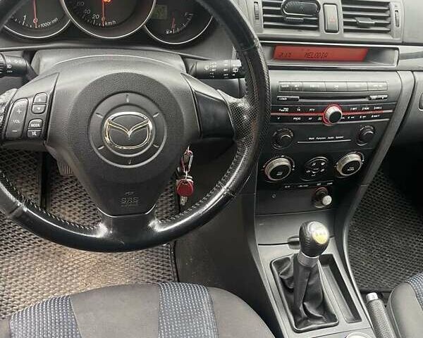 Чорний Мазда 3, об'ємом двигуна 1.6 л та пробігом 230 тис. км за 2600 $, фото 4 на Automoto.ua