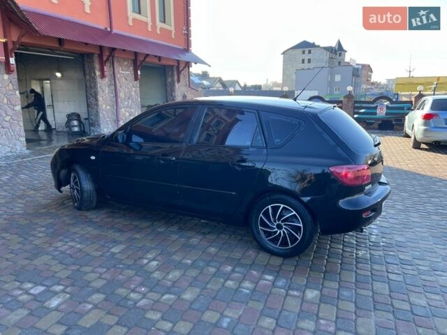 Черный Мазда 3, объемом двигателя 1.4 л и пробегом 290 тыс. км за 4777 $, фото 2 на Automoto.ua