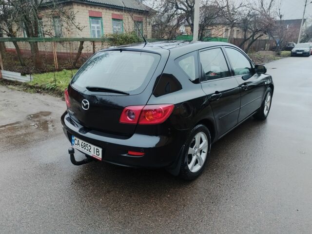 Чорний Мазда 3, об'ємом двигуна 1.6 л та пробігом 242 тис. км за 4250 $, фото 4 на Automoto.ua