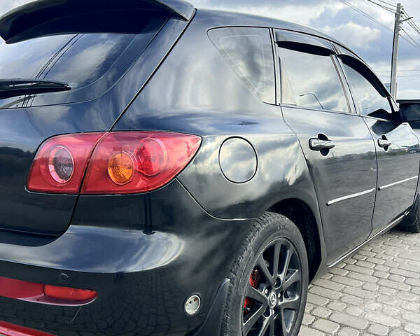 Чорний Мазда 3, об'ємом двигуна 1.6 л та пробігом 220 тис. км за 4700 $, фото 10 на Automoto.ua