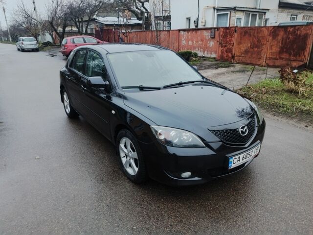 Чорний Мазда 3, об'ємом двигуна 1.6 л та пробігом 242 тис. км за 4250 $, фото 7 на Automoto.ua
