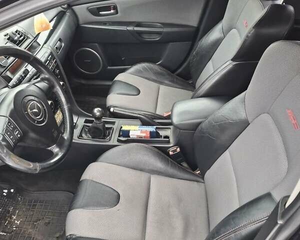 Чорний Мазда 3, об'ємом двигуна 1.6 л та пробігом 285 тис. км за 4500 $, фото 12 на Automoto.ua
