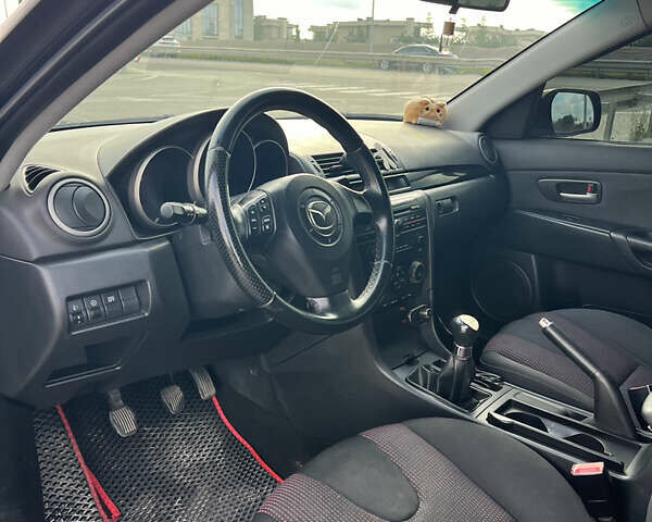 Чорний Мазда 3, об'ємом двигуна 1.6 л та пробігом 220 тис. км за 4700 $, фото 21 на Automoto.ua