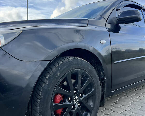 Чорний Мазда 3, об'ємом двигуна 1.6 л та пробігом 220 тис. км за 4700 $, фото 8 на Automoto.ua