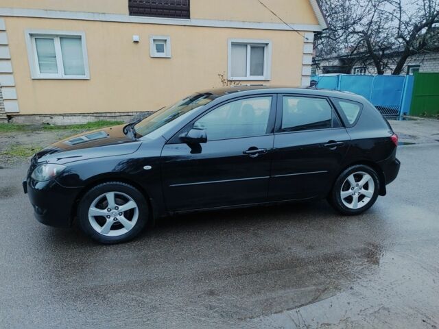 Чорний Мазда 3, об'ємом двигуна 1.6 л та пробігом 242 тис. км за 4250 $, фото 1 на Automoto.ua