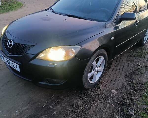 Чорний Мазда 3, об'ємом двигуна 1.56 л та пробігом 376 тис. км за 4400 $, фото 1 на Automoto.ua