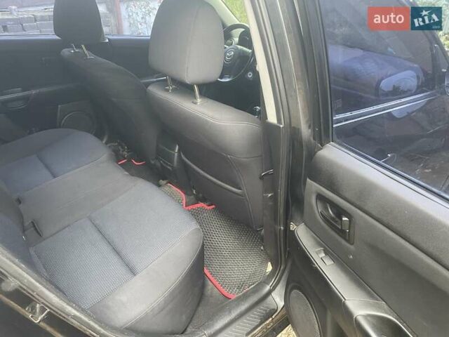 Чорний Мазда 3, об'ємом двигуна 2 л та пробігом 274 тис. км за 4200 $, фото 17 на Automoto.ua