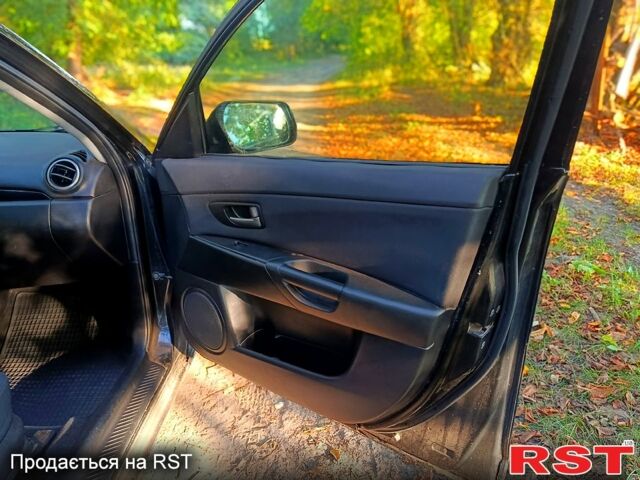 Черный Мазда 3, объемом двигателя 1.6 л и пробегом 124 тыс. км за 2950 $, фото 8 на Automoto.ua