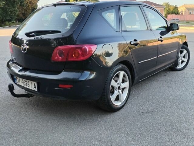 Чорний Мазда 3, об'ємом двигуна 1.6 л та пробігом 333 тис. км за 2651 $, фото 4 на Automoto.ua