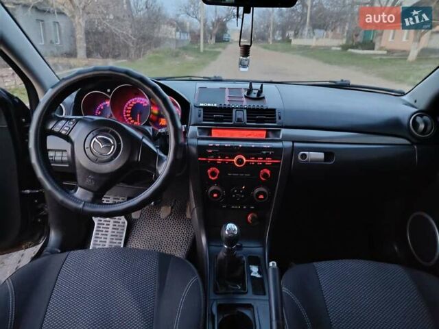 Чорний Мазда 3, об'ємом двигуна 1.56 л та пробігом 376 тис. км за 4400 $, фото 6 на Automoto.ua