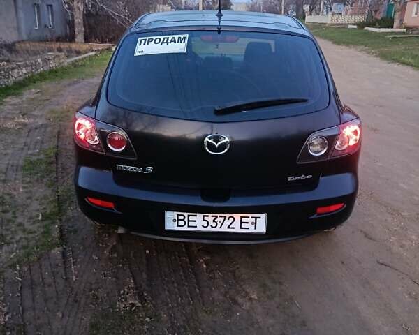 Чорний Мазда 3, об'ємом двигуна 1.56 л та пробігом 376 тис. км за 4400 $, фото 4 на Automoto.ua