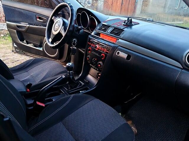 Чорний Мазда 3, об'ємом двигуна 1.6 л та пробігом 376 тис. км за 4400 $, фото 7 на Automoto.ua