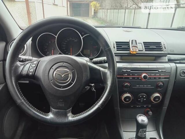 Черный Мазда 3, объемом двигателя 1.6 л и пробегом 145 тыс. км за 4500 $, фото 1 на Automoto.ua
