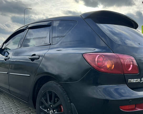 Чорний Мазда 3, об'ємом двигуна 1.6 л та пробігом 220 тис. км за 4700 $, фото 11 на Automoto.ua