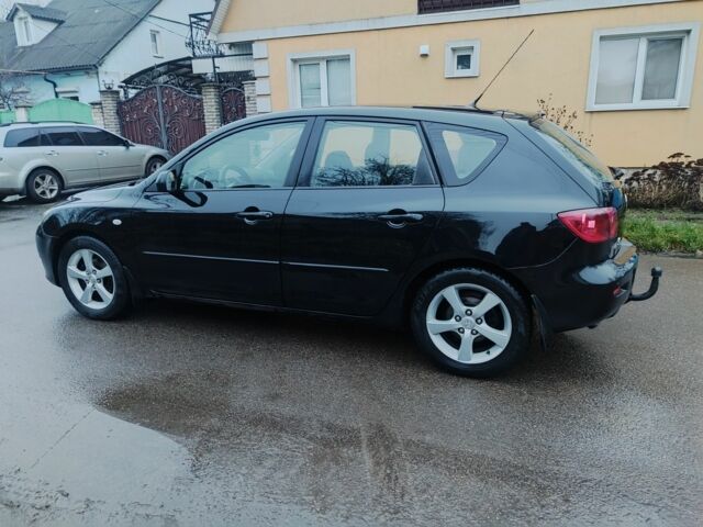 Чорний Мазда 3, об'ємом двигуна 1.6 л та пробігом 242 тис. км за 4250 $, фото 2 на Automoto.ua