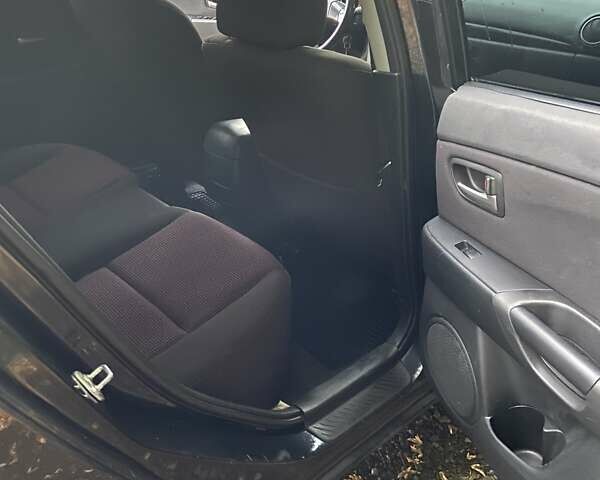 Черный Мазда 3, объемом двигателя 1.6 л и пробегом 171 тыс. км за 3600 $, фото 16 на Automoto.ua