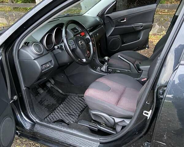 Черный Мазда 3, объемом двигателя 1.6 л и пробегом 171 тыс. км за 3600 $, фото 13 на Automoto.ua