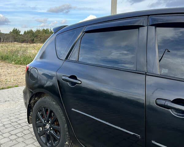 Чорний Мазда 3, об'ємом двигуна 1.6 л та пробігом 220 тис. км за 4700 $, фото 12 на Automoto.ua