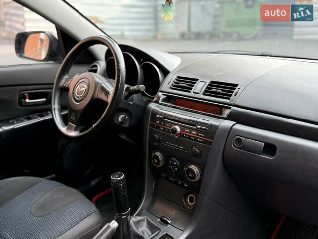 Мазда 3 2004 у Дніпро (Дніпропетровську) на Automoto.ua Чорний Мазда 3, об'ємом двигуна 1.6 л та пробігом 358 тис. км за 3300 $, фото 6 на Automoto.ua