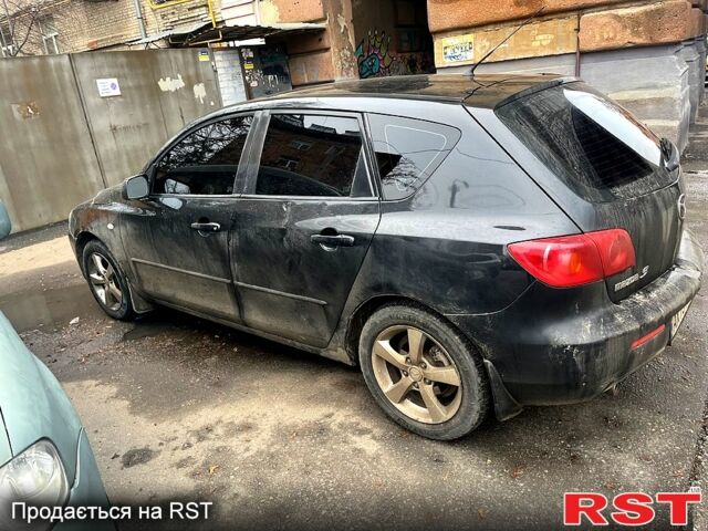 Чорний Мазда 3, об'ємом двигуна 1.6 л та пробігом 246 тис. км за 3500 $, фото 2 на Automoto.ua