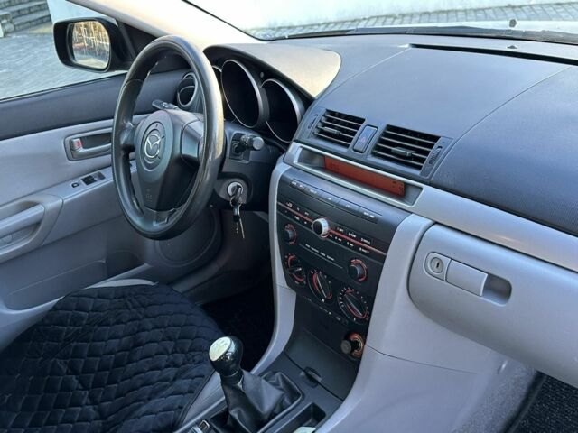 Черный Мазда 3, объемом двигателя 1.6 л и пробегом 232 тыс. км за 4250 $, фото 20 на Automoto.ua