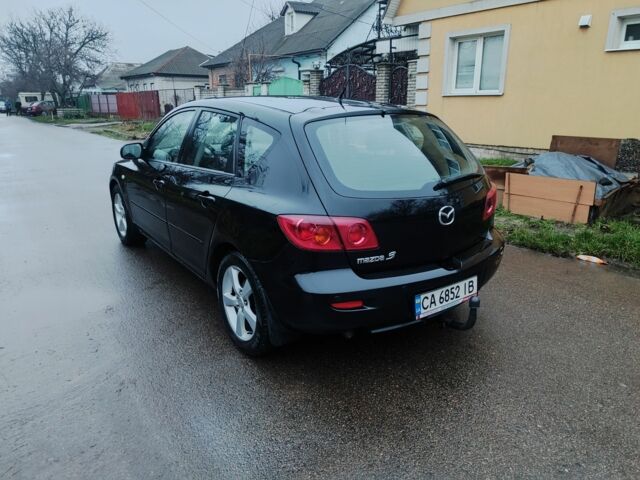 Чорний Мазда 3, об'ємом двигуна 1.6 л та пробігом 242 тис. км за 4250 $, фото 3 на Automoto.ua