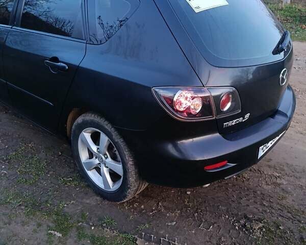Чорний Мазда 3, об'ємом двигуна 1.56 л та пробігом 376 тис. км за 4400 $, фото 2 на Automoto.ua