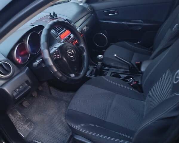 Чорний Мазда 3, об'ємом двигуна 1.56 л та пробігом 376 тис. км за 4400 $, фото 7 на Automoto.ua