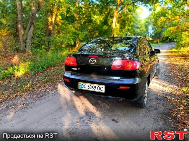Черный Мазда 3, объемом двигателя 1.6 л и пробегом 124 тыс. км за 2950 $, фото 3 на Automoto.ua