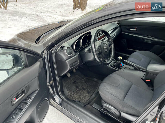 Чорний Мазда 3, об'ємом двигуна 1.6 л та пробігом 324 тис. км за 2450 $, фото 10 на Automoto.ua