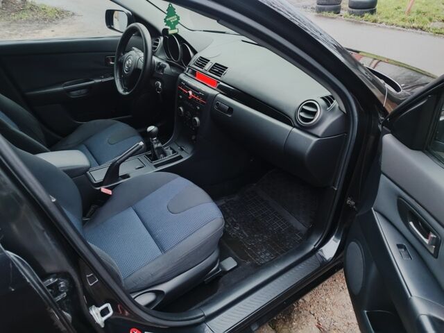 Чорний Мазда 3, об'ємом двигуна 1.6 л та пробігом 242 тис. км за 4250 $, фото 12 на Automoto.ua