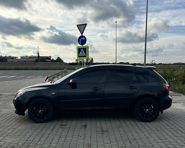 Чорний Мазда 3, об'ємом двигуна 1.6 л та пробігом 220 тис. км за 4700 $, фото 7 на Automoto.ua