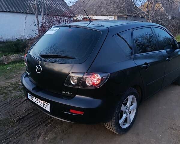Чорний Мазда 3, об'ємом двигуна 1.56 л та пробігом 376 тис. км за 4400 $, фото 5 на Automoto.ua