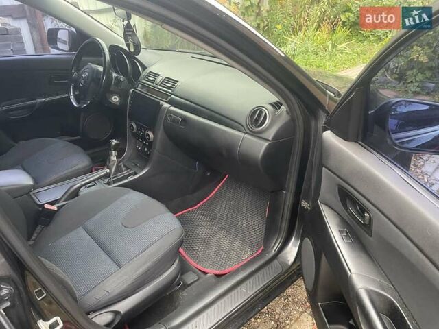 Чорний Мазда 3, об'ємом двигуна 2 л та пробігом 274 тис. км за 4200 $, фото 18 на Automoto.ua