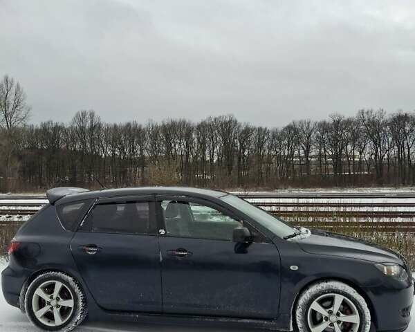 Чорний Мазда 3, об'ємом двигуна 1.6 л та пробігом 285 тис. км за 4500 $, фото 5 на Automoto.ua