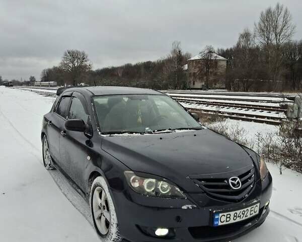 Чорний Мазда 3, об'ємом двигуна 1.6 л та пробігом 285 тис. км за 4500 $, фото 4 на Automoto.ua