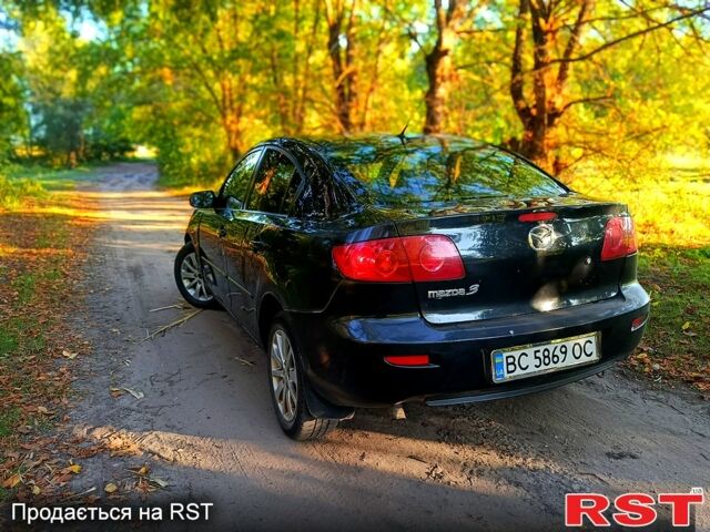 Черный Мазда 3, объемом двигателя 1.6 л и пробегом 124 тыс. км за 2950 $, фото 4 на Automoto.ua
