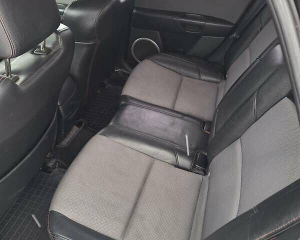 Чорний Мазда 3, об'ємом двигуна 1.6 л та пробігом 285 тис. км за 4500 $, фото 10 на Automoto.ua