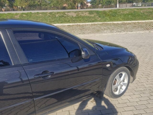 Чорний Мазда 3, об'ємом двигуна 1.6 л та пробігом 316 тис. км за 3869 $, фото 2 на Automoto.ua