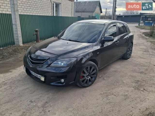 Черный Мазда 3, объемом двигателя 2 л и пробегом 330 тыс. км за 3000 $, фото 3 на Automoto.ua