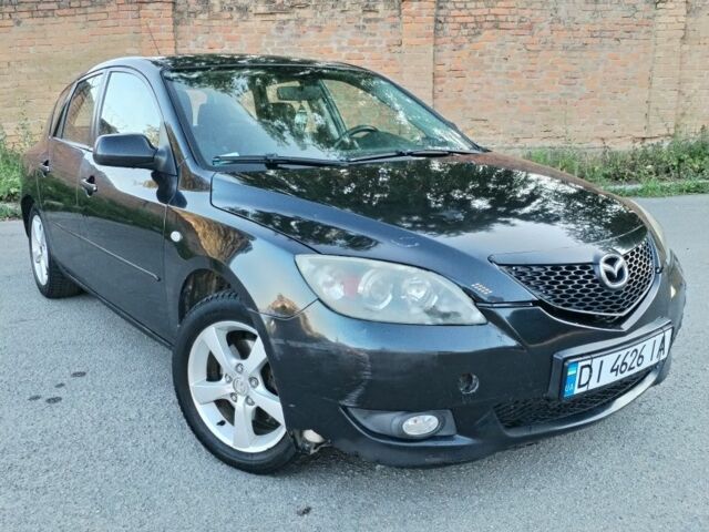 Чорний Мазда 3, об'ємом двигуна 1.6 л та пробігом 333 тис. км за 2651 $, фото 8 на Automoto.ua